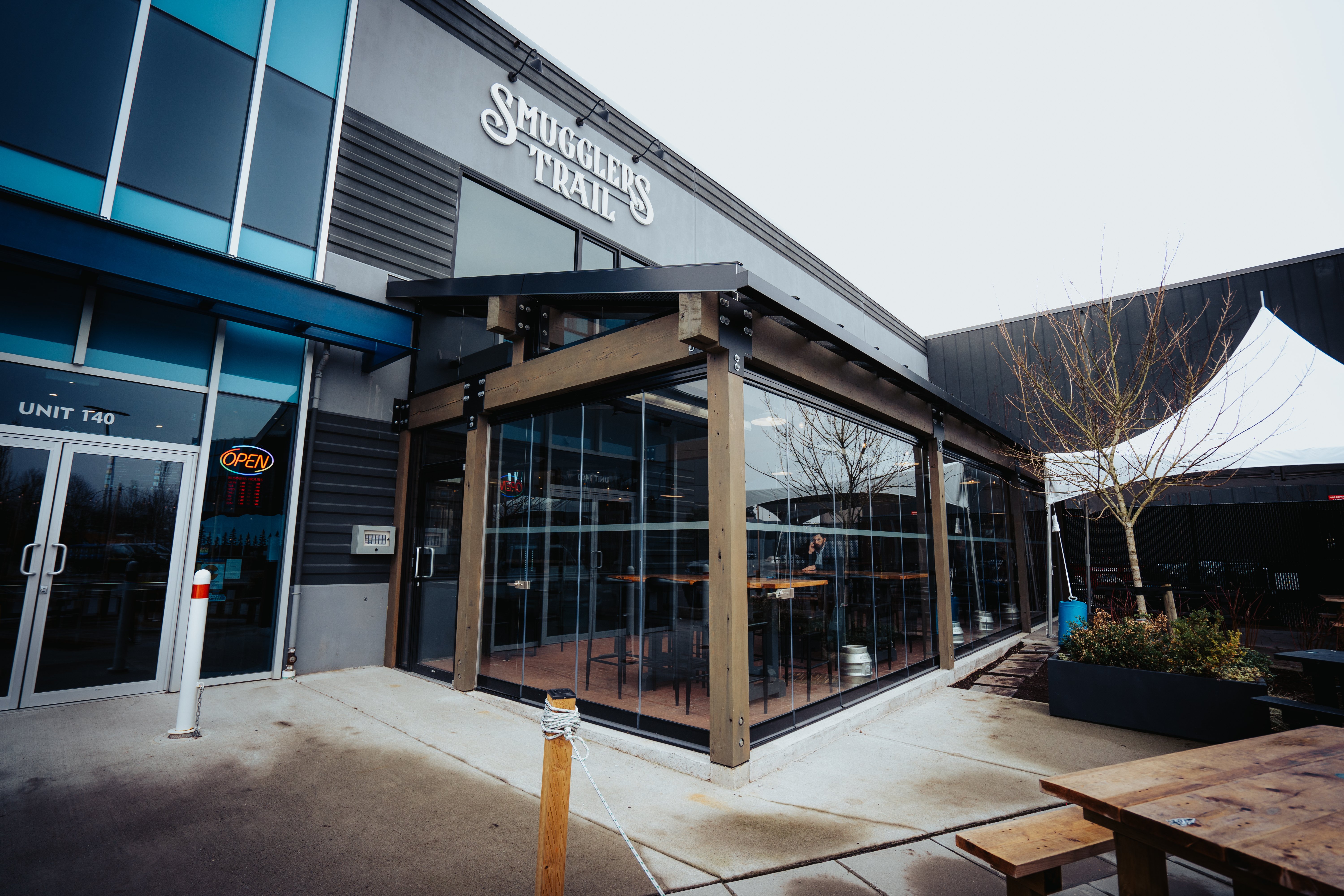 Restaurant patio enclosed in glass