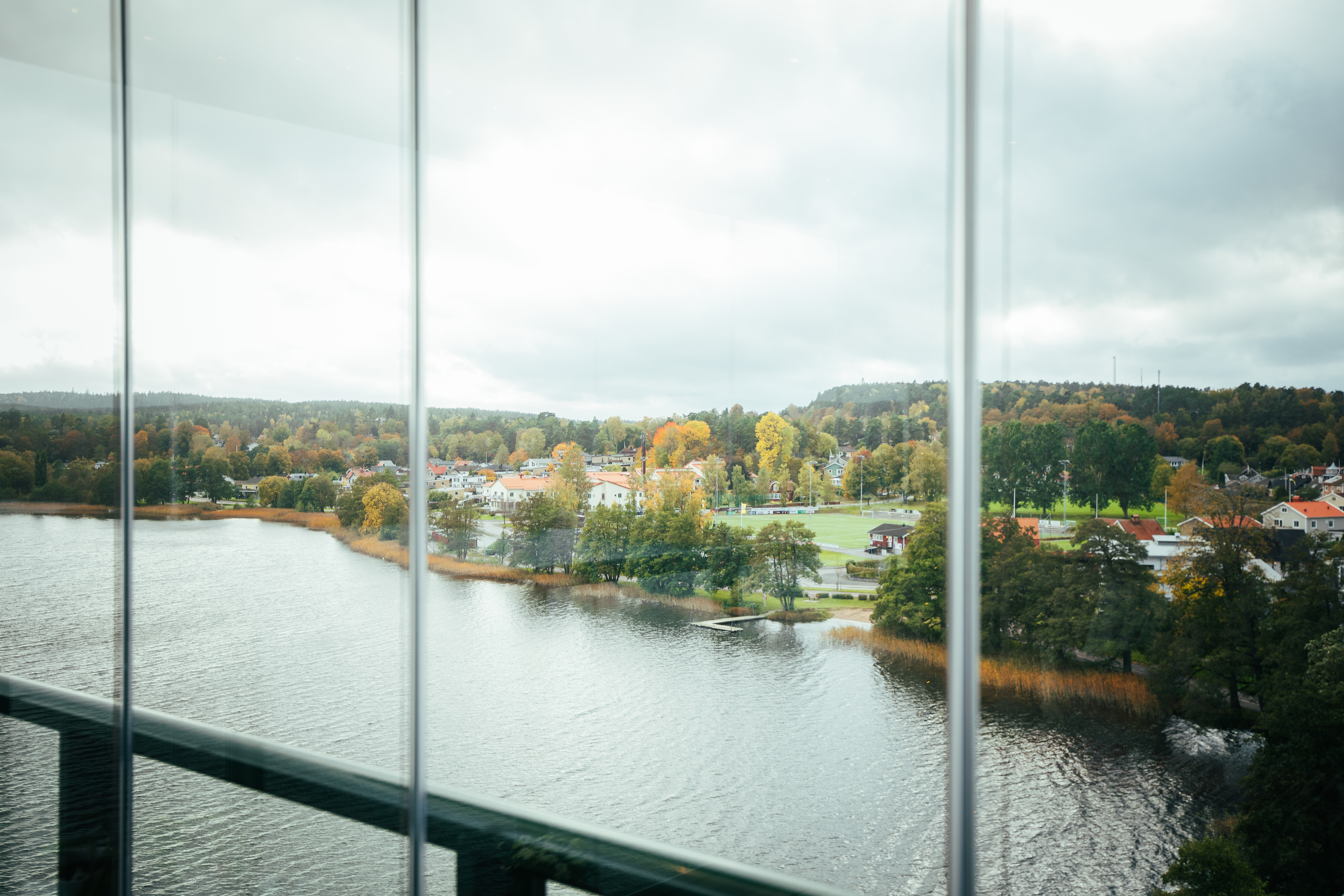 Autumn is the coziest season for your outdoor living space: Looking at autumn scenery from a glazed balcony